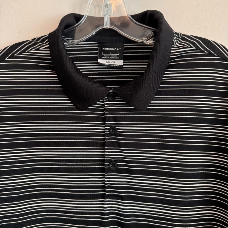 Polo Nike Golf Dri Fit para hombre, talla L, negro, blanco, rayas Swoosh. imagen 5