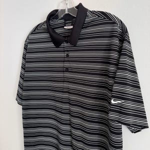 Polo Nike Golf Dri Fit para hombre, talla L, negro, blanco, rayas Swoosh. imagen 3