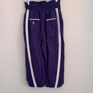 Pantaloni da jogging da donna Free People FP Movement, taglia media, colore ametista scuro, modello Wayside, NUOVI immagine 3