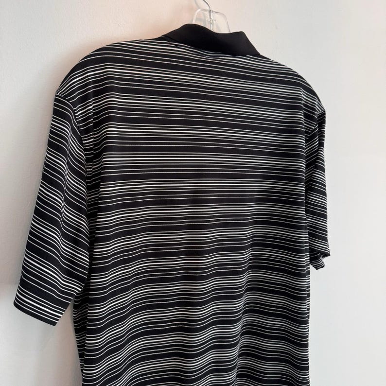 Polo Nike Golf Dri Fit para hombre, talla L, negro, blanco, rayas Swoosh. imagen 9