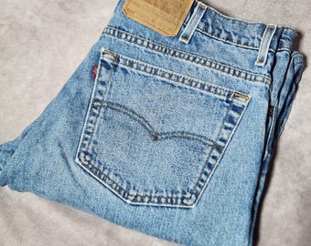 Vaqueros Levi's 550 azules vintage de los años 90 para hombre, corte relajado, ajustados, 40 x 27 cm. *Modificados.