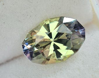 Grüner, natürlicher, unbehandelter Tansanit-Edelstein: 0,82 ct, oval geschliffen, facettiert, lose | 7,5 x 5 mm | #GLF408