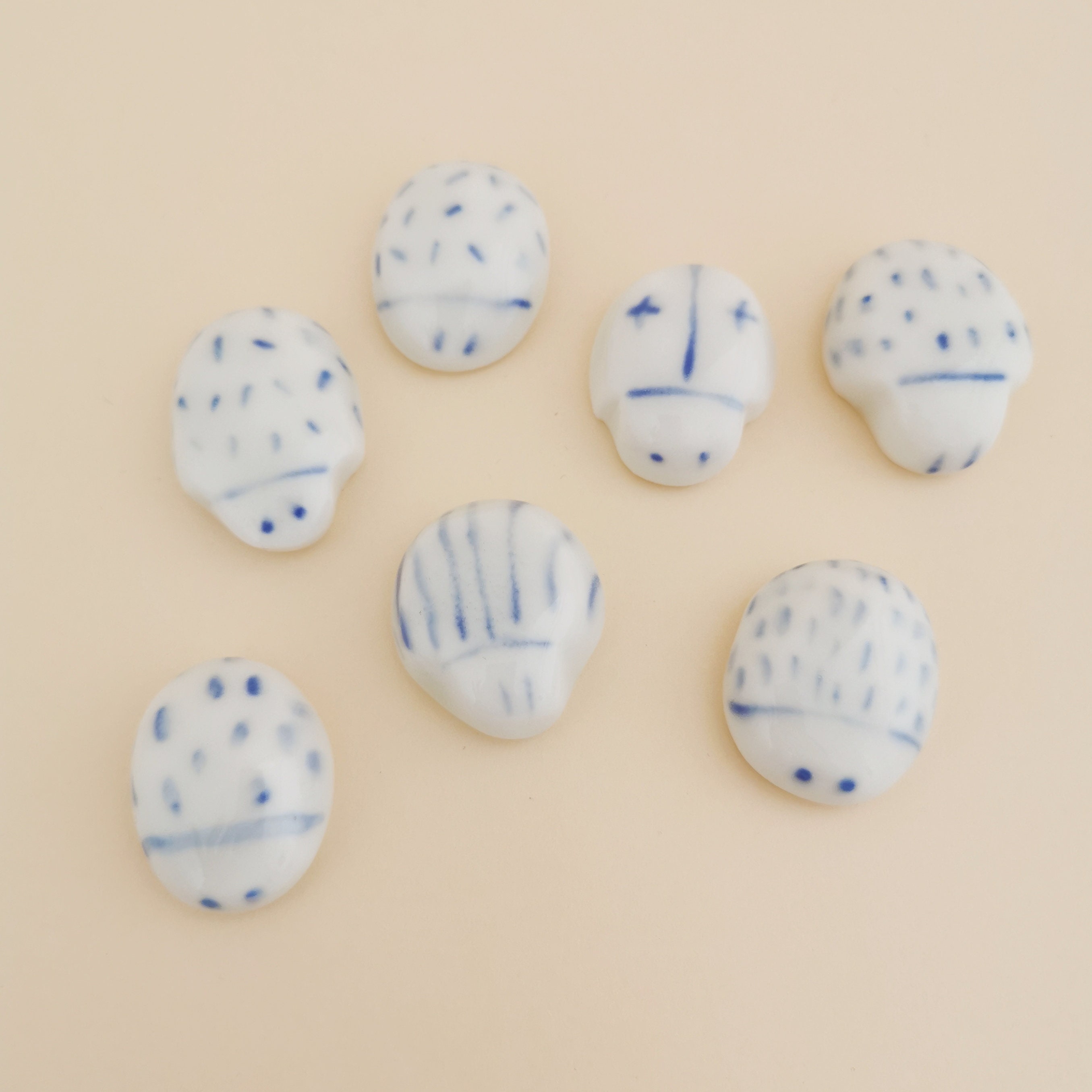 Grigri Coccinelle en Porcelaine