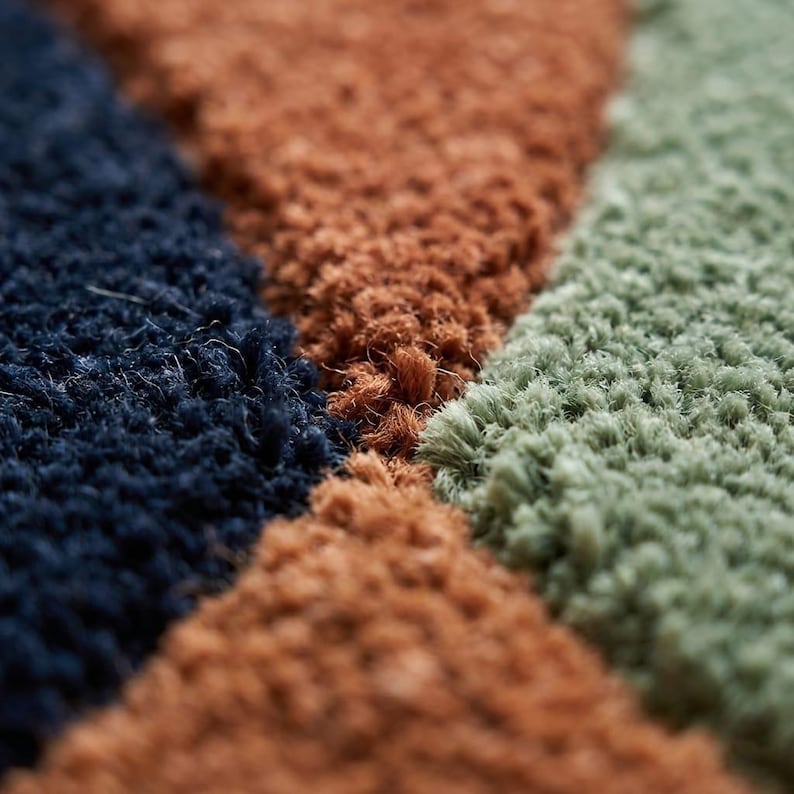 Retro Geometric Rug Texture Close Up - Navy Terracotta Amber Sage Wool Colours - Deep Texture Carpet - Hand Tufted Wool Rug Quality Detail
