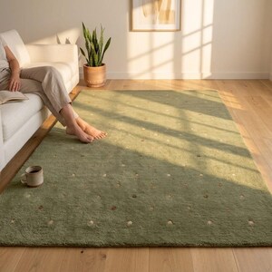 Sage Green Tufted Wool Rug in Scandi Living Room - Person Sitting Barefoot - Soft Wool Area Rug - Warm Color Rug - Boho Living Room Rug