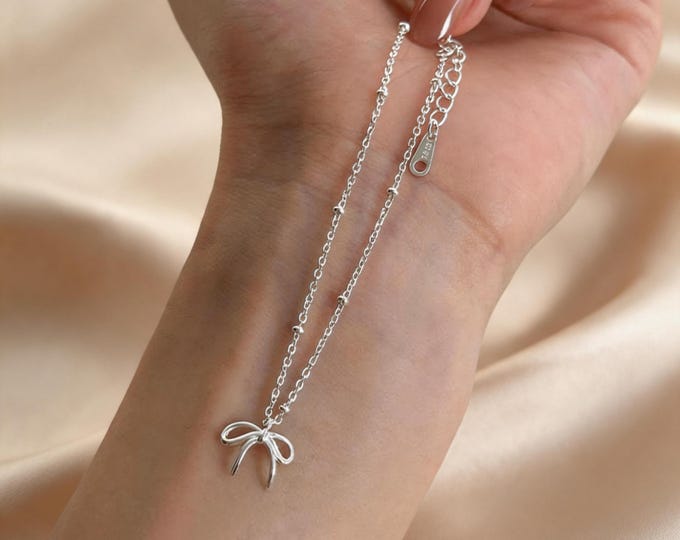 S925 Sterling Silver Hollow Bowknot Bracelet - Dainty Minimalist Ribbon Chain for Women, Shimmering Silver Jewelry, Adjustable Gift for Her