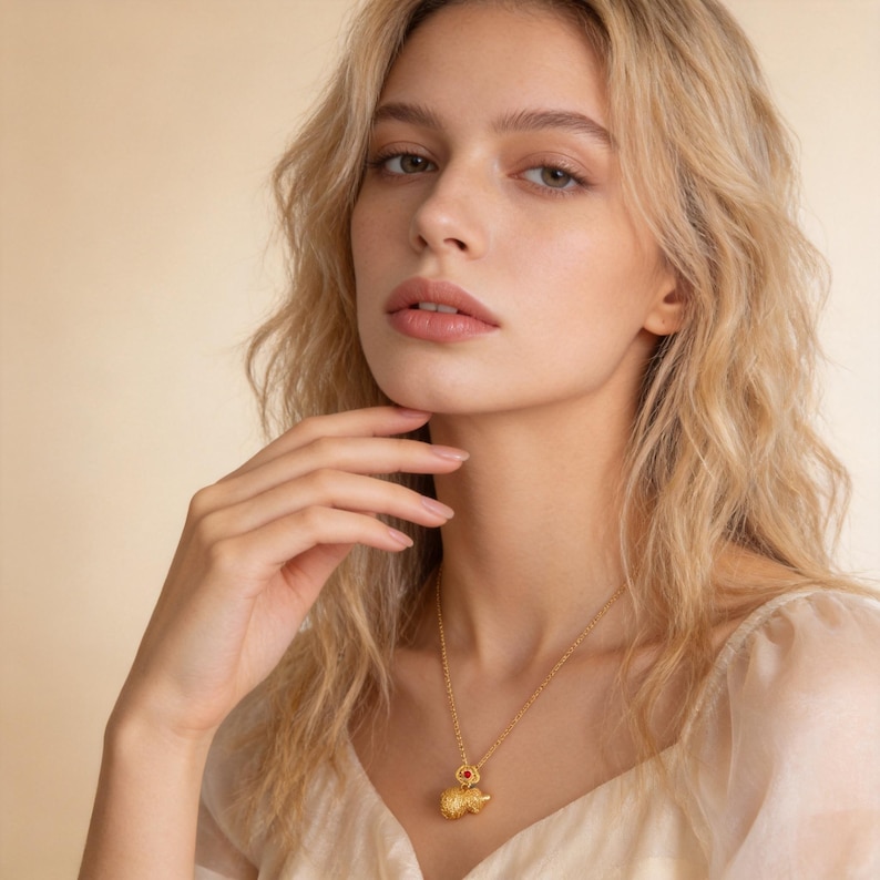 Handmade 18K gold plated filigree gourd pendant necklace featuring matte finish surface. Classic double-bulb Hulu shape with intricate cloud scroll openwork patterns. Stylized four-lobed flower bail with vibrant red gemstone center accent. Twisted rope chain, nickel-free copper alloy. 50cm length, 10g weight. Lucky charm symbolizing health and prosperity.