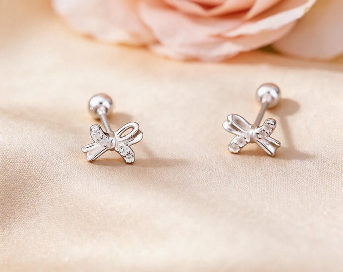 Charming Adorable Sleep-Friendly S999 Silver Hollow Bow Stud Earrings with Micro Pave CZ, Secure Screw Back Gift for Her Daily Wear.