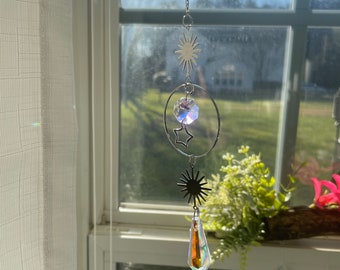 Sun worship silver suncatcher with 3 crystals, and sun & star charms