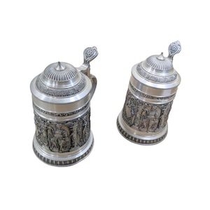 Vintage German Pewter Beer Steins with Lids - Set of 2 | BMF Zinn 97% | Medieval Relief Design | Collectible Tankards