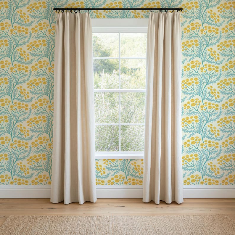 a room with a window, curtains, and a floral wallpaper.