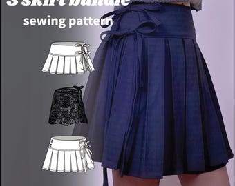 May include: A navy blue pleated wrap skirt with side tie closures, paired with a gray cardigan. The image includes text reading 3 skirt bundle sewing pattern and wrap and overskirt, alongside three white line-art illustrations of skirt designs.