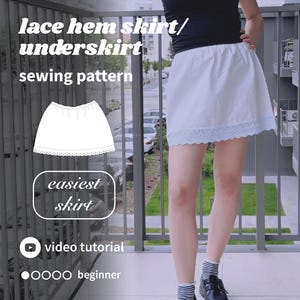 May include: A white skirt with a lace hem and an elastic waistband, presented as a sewing pattern. The image includes text reading lace hem skirt/underskirt sewing pattern, easiest skirt, video tutorial, and beginner with four circles.