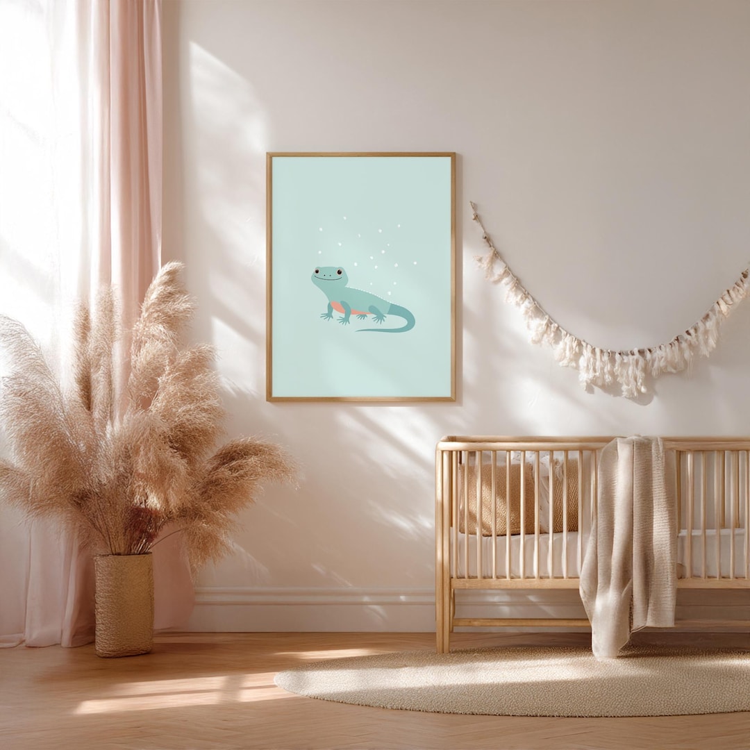Gecko Nursery Art Print: a cartoon gecko in blue and teal on a light blue background, shown in a gold frame.