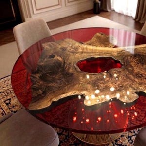 May include: A set of three ceramic mugs with a speckled, matte finish. The mugs are in shades of cream, light gray, and dark gray. Each mug has a simple, minimalist design and a rounded handle.