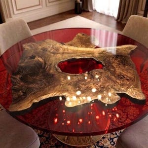 May include: A white ceramic mug with a black handle and the text "But First, Coffee" in a black, bold font. The mug is on a white surface. The mug appears to be 4 inches tall.