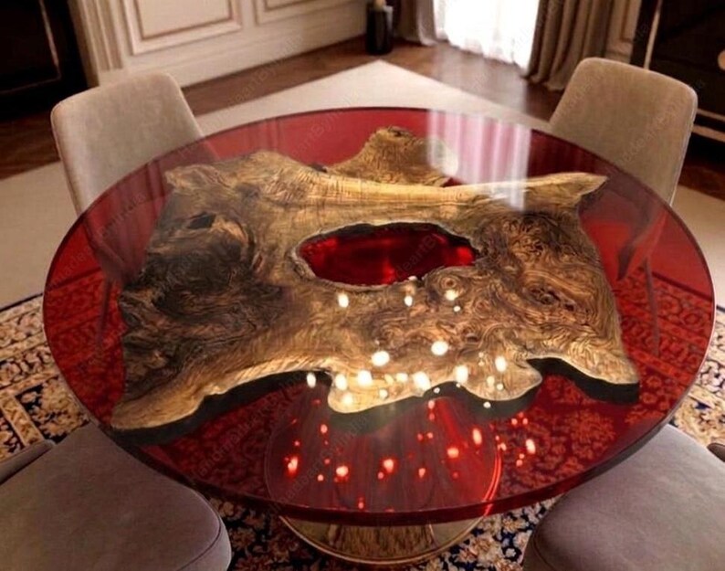 May include: A white ceramic mug with a black handle and the text "But First, Coffee" in a black, bold font. The mug is on a white surface. The mug appears to be 4 inches tall.