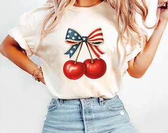 Comfort Colors® 4th of July Shirt, Coquette American Flag Shirt, USA Bow Shirt, USA Cherry Shirt, Women Patriotic Shirt, Red White and Blue