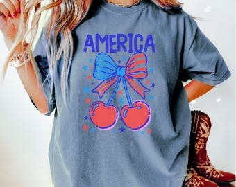 Comfort Colors® 4th of July Shirt, Coquette American Flag Shirt, USA Bow Shirt, USA Cherry Shirt, Women Patriotic Shirt, Red White and Blue