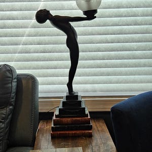 Art Deco Style Lamp LUMINA Standing Ceramic Sculpture Max Le Verrier mounted on leather bound vintage books