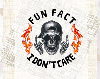 May include: A black and white graphic of a skull wearing sunglasses and a backward baseball cap, giving the middle finger. The text "FUN FACT I DON'T CARE" surrounds the skull, with flames on either side.