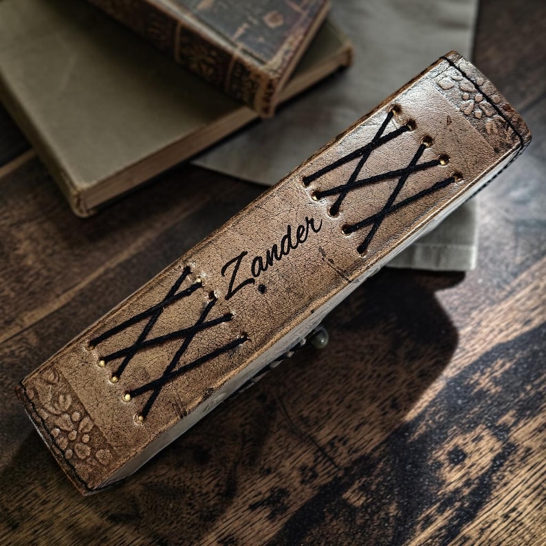 Custom name engraved on leather journal personalization example double dragon design