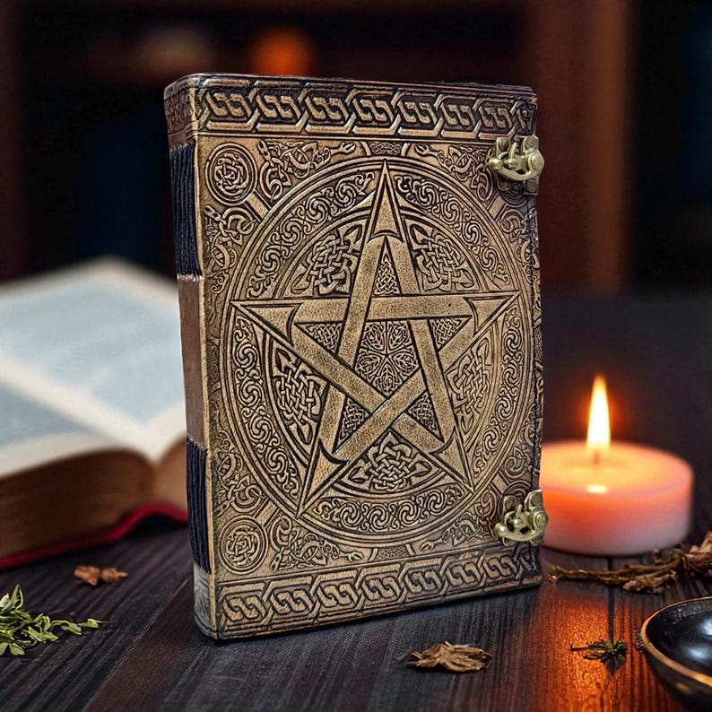 "Rustic handmade leather journal with witchcraft symbol"