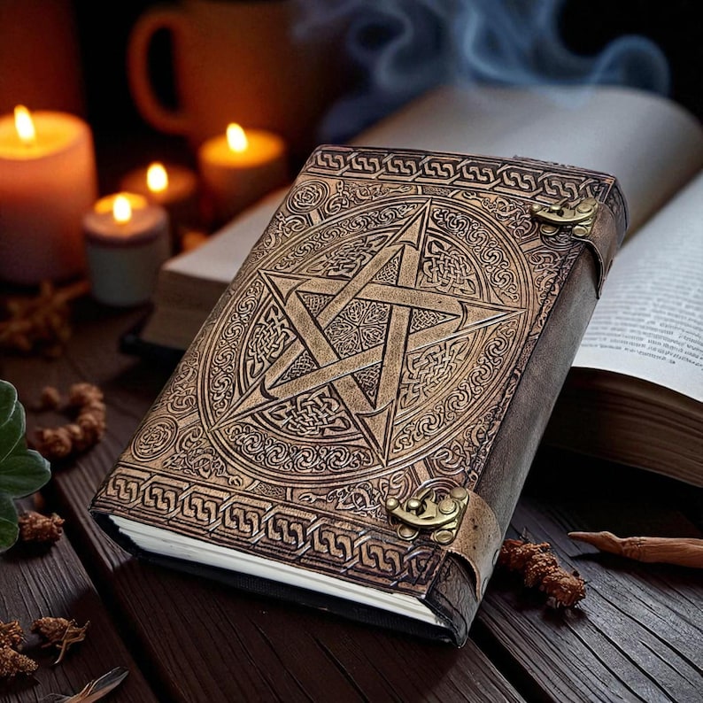 "Handmade leather journal with embossed pentagram design"