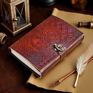 "Medieval style dragon leather-bound sketchbook"