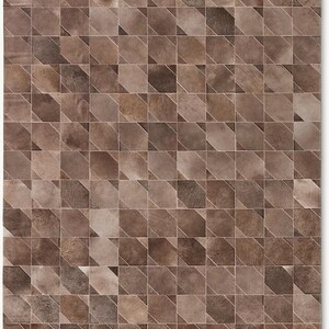 May include: A rectangular rug with a geometric pattern. The rug features a repeating design of squares and diagonal lines in various shades of brown, creating a textured appearance. The rug's design is symmetrical and visually appealing.