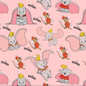Cute Disney-style cotton fabric with Dumbo print, sold by half yard
