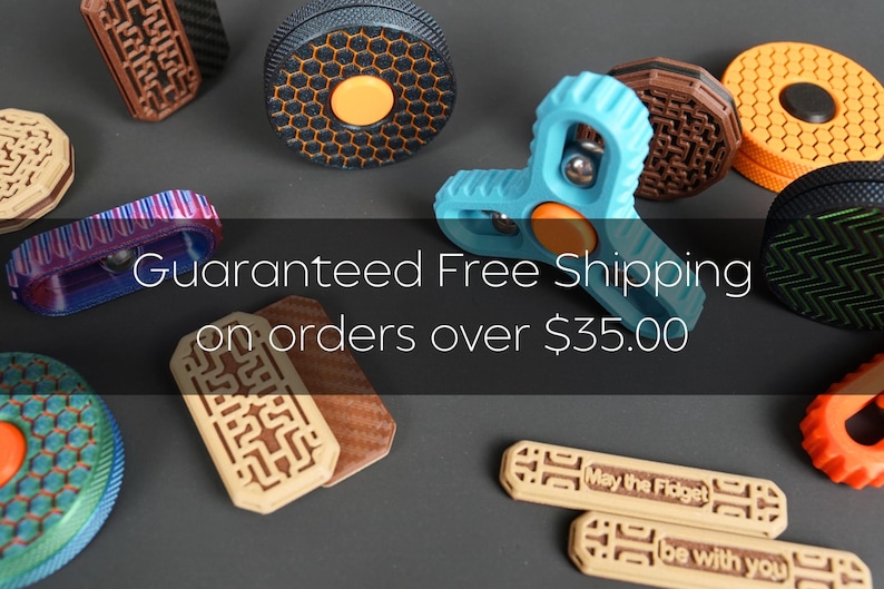 May include: A collection of colorful fidget toys in various shapes and designs, including spinners and bars. The image includes the text "Guaranteed Free Shipping on orders over $35.00". The fidgets are in shades of blue, orange, brown, and green.