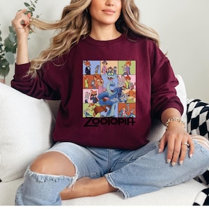 Pu&ograve; includere: Felpa girocollo bordeaux con una grafica colorata dei personaggi del film d'animazione Zootropolis. La parola "Zootopia" &egrave; stampata in nero nella parte inferiore della grafica. La felpa &egrave; realizzata in un materiale morbido.