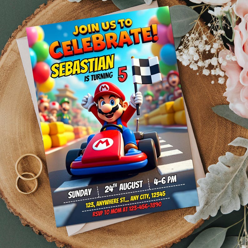 May include: A birthday party invitation featuring a cartoon character in a red kart, holding a checkered flag. The invitation reads "Join us to Celebrate! Sebastian is turning 5" with event details. The invitation is on a wooden surface.