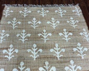Handwoven Jute Rug – Rustic Cotton Edge, White Floral Design