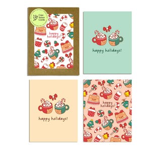 May include: Set of four holiday greeting cards. Each card features a cute cartoon design with hot cocoa, candy canes, and a bear character. The words "happy holidays!" are written on the cards.