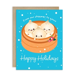 May include: A greeting card with a blue background and the words "From our steamer to yours" and "Happy Holidays." The card features a cartoon illustration of three smiling dumplings in a bamboo steamer.