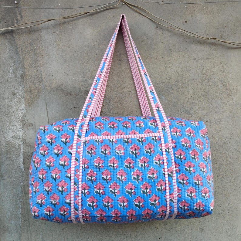 Cotton Quilted Duffle Bag Blue With Pink Floral Pattern, Indian Cotton Quilted Tote Bag Floral Print, Cotton Duffle Bag Large, Duffle Bags Handmade Travel Vintage, Hand Block Grocery shopping for women Jola Bags Carry Bags Shoulder, Market Daily Use Shopping Duffle Bag Toiletry Bags, Hand Block Printed Duffle Bags, Ethnic Handbags Cotton Quilted Tote Bag, Lightweight Cotton Weekender Bag, Traditional Hand Block Printed Floral Design And Quilted Finish, Reusable Overnight Trips And Gifting