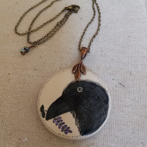 Handpainted raven necklace