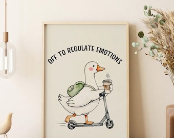 May include: A framed wall art print featuring a white goose with a green backpack riding a gray scooter while holding a steaming coffee cup. The text above the goose reads OFF TO REGULATE EMOTIONS in black capital letters against a cream background.