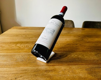 Minimalist wine bottle stand