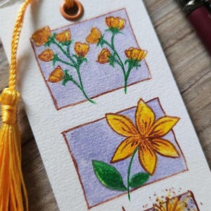 Hand-painted floral bookmark – original watercolor art on cotton paper with tassel. A cute gift for book lovers & readers.