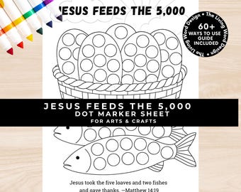 May include: Black and white dot marker sheet with the text "JESUS FEEDS THE 5,000" and illustrations of a basket with eggs and fish. Includes the text "DOT MARKER SHEET FOR ARTS & CRAFTS" and a Bible verse. Markers are visible in the upper left corner.