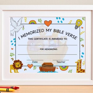 May include: Framed certificate with the text "I MEMORIZED MY BIBLE VERSE". The certificate has a light blue background with illustrations of a dove, rainbow, lion, giraffe, and Noah's Ark. Includes spaces for the recipient's name, date, and teacher.