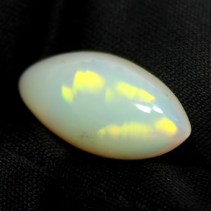 3.35 Carats! Natural Ethiopian Opal Cabochon Marquise. 18x9MM Size Opal Marquise. Multi Color Fire Opal. Loose Gemstone.