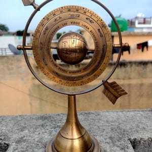Maritime Brass Armillary Sphere with Arrow – Nautical Astrolabe Globe, Engraved Marine Decor, Tabletop Gift, Christmas Decoration