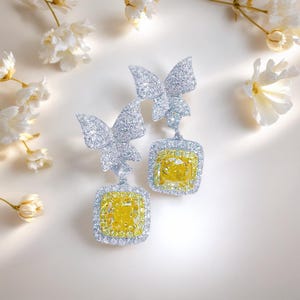 Elegant Butterfly Earrings –  Cushion Cut Yellow Diamond Drop with White CZ Pavé Wings