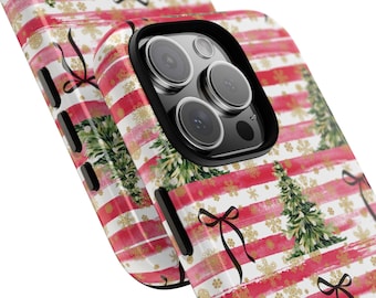 May include: A close-up of two phone cases with a festive Christmas design. The cases feature red and white stripes, green Christmas trees, gold snowflakes, and black bows. The phone cases have a black camera lens protector.