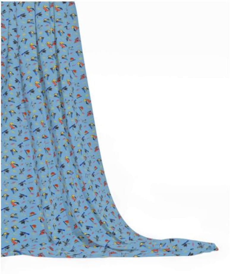 May include: Light blue fabric with a repeating pattern of colorful birds. The birds are depicted in various poses with red, yellow, blue, and black details. The fabric is draped, showcasing its texture and design.