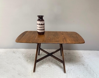 Stół jadalny Ercol Old Colonial 377 z opuszczanym blatem, z litego wiązu, z niebieską etykietą, lata 50. XX wieku